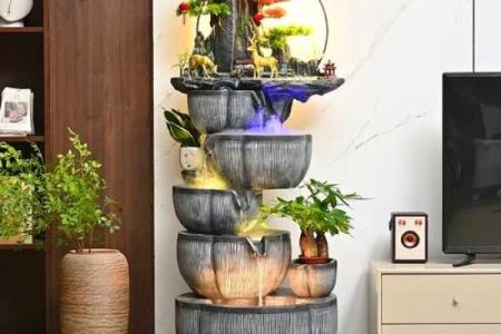 房子前面装假山喷泉风水